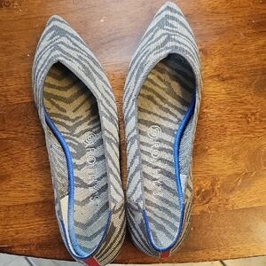 Rothy's Zebra Patterned Flats with Blue Trim